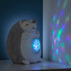 Spikey™ – Erizo de Peluche con Ruido Blanco y Proyector Quitamiedos